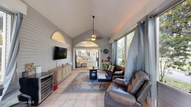 Discover luxury meets nature in this turnkey fully furnished on The Great Outdoors Golf and Country Club in Florida - for sale on GolfHomes.com, golf home, golf lot