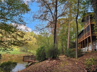 Escape city living in this stunning 2 bed/2 bath cabin plus loft on White Path Golf Club in Georgia - for sale on GolfHomes.com, golf home, golf lot