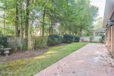 This beautiful Custom Home in Diamondhead has elegant upgrades on Diamondhead Country Club in Mississippi - for sale on GolfHomes.com, golf home, golf lot
