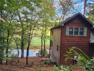 Escape city living in this stunning 2 bed/2 bath cabin plus loft on White Path Golf Club in Georgia - for sale on GolfHomes.com, golf home, golf lot