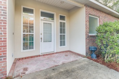This beautiful Custom Home in Diamondhead has elegant upgrades on Diamondhead Country Club in Mississippi - for sale on GolfHomes.com, golf home, golf lot