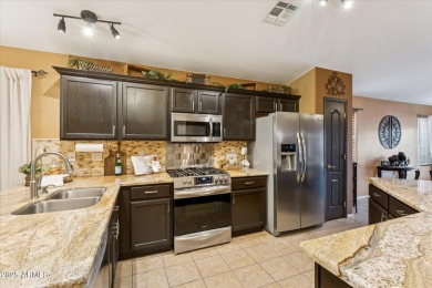 From poolside to greenside in a matter of minutes! Situated on Lone Tree Golf Club in Arizona - for sale on GolfHomes.com, golf home, golf lot