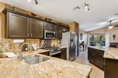 From poolside to greenside in a matter of minutes! Situated on Lone Tree Golf Club in Arizona - for sale on GolfHomes.com, golf home, golf lot