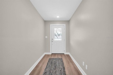 Experience elevated Florida living in this breathtaking, fully on Highland Lakes Executive Golf Course in Florida - for sale on GolfHomes.com, golf home, golf lot