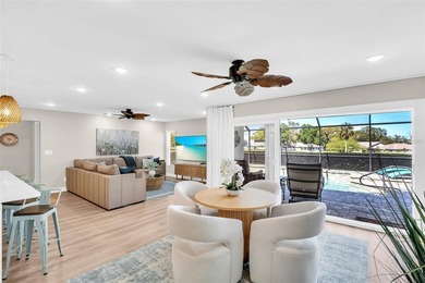 Experience elevated Florida living in this breathtaking, fully on Highland Lakes Executive Golf Course in Florida - for sale on GolfHomes.com, golf home, golf lot