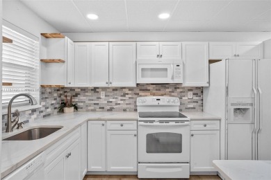 BEAUTIFUL 55+ GATED COMMUNITY! **REMODELED** unit featuring 2 on Inverrary Country Club in Florida - for sale on GolfHomes.com, golf home, golf lot