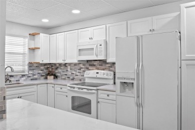 BEAUTIFUL 55+ GATED COMMUNITY! **REMODELED** unit featuring 2 on Inverrary Country Club in Florida - for sale on GolfHomes.com, golf home, golf lot
