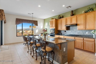 Perched on a view lot in the desirable Prescott Lakes community on Prescott Lakes Golf and Country Club in Arizona - for sale on GolfHomes.com, golf home, golf lot