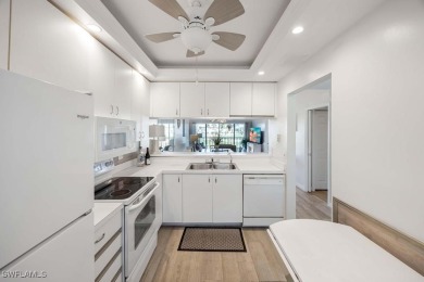 Golf Course Condo with Stunning Lake  Fairway Views - Motivated on Golfview Golf and Racquet Club in Florida - for sale on GolfHomes.com, golf home, golf lot