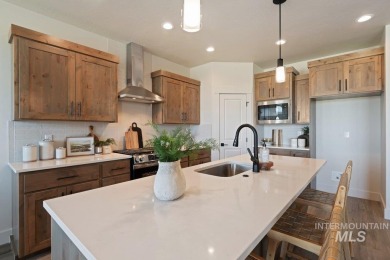Thoughtfully designed single-level floor plan offers 3 bedrooms on Hunters Point Golf Club in Idaho - for sale on GolfHomes.com, golf home, golf lot