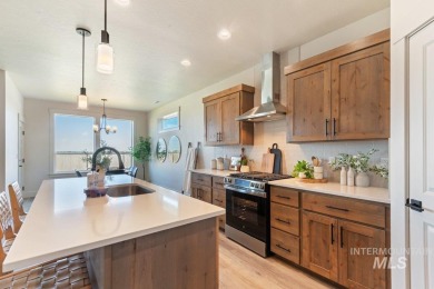 Thoughtfully designed single-level floor plan offers 3 bedrooms on Hunters Point Golf Club in Idaho - for sale on GolfHomes.com, golf home, golf lot