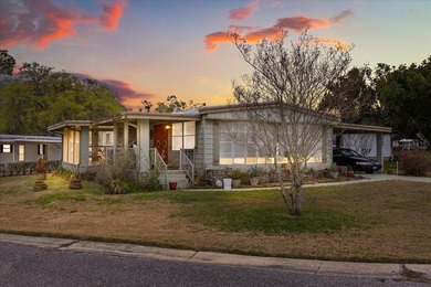 Grab your Towel and Sunscreen and WALK to the Heated Salt Water on Zellwood Station Country Club in Florida - for sale on GolfHomes.com, golf home, golf lot