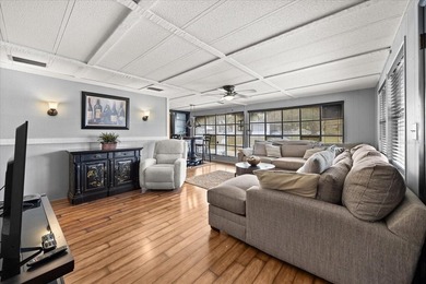 Grab your Towel and Sunscreen and WALK to the Heated Salt Water on Zellwood Station Country Club in Florida - for sale on GolfHomes.com, golf home, golf lot