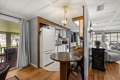 Grab your Towel and Sunscreen and WALK to the Heated Salt Water on Zellwood Station Country Club in Florida - for sale on GolfHomes.com, golf home, golf lot