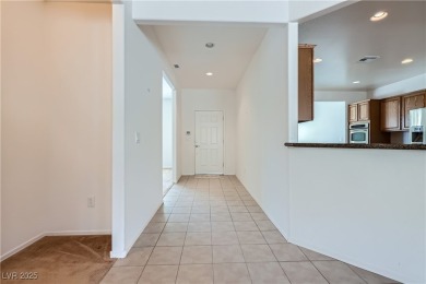Nestled within the vibrant 55+ Sun City Aliante community, 7465 on Aliante Golf Club in Nevada - for sale on GolfHomes.com, golf home, golf lot