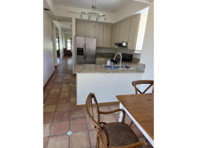 Fabulous and most desired 1 level end unit patio home with 2 BR on PGA National Golf Club in Florida - for sale on GolfHomes.com, golf home, golf lot