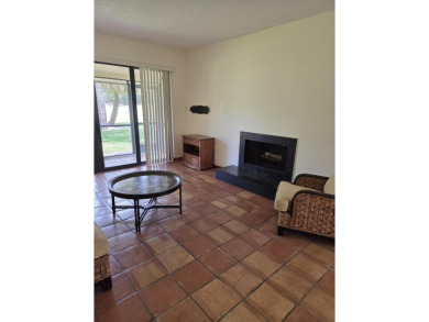Fabulous and most desired 1 level end unit patio home with 2 BR on PGA National Golf Club in Florida - for sale on GolfHomes.com, golf home, golf lot