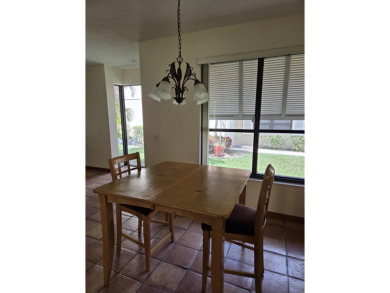 Fabulous and most desired 1 level end unit patio home with 2 BR on PGA National Golf Club in Florida - for sale on GolfHomes.com, golf home, golf lot