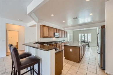 Nestled within the vibrant 55+ Sun City Aliante community, 7465 on Aliante Golf Club in Nevada - for sale on GolfHomes.com, golf home, golf lot