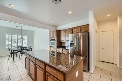 Nestled within the vibrant 55+ Sun City Aliante community, 7465 on Aliante Golf Club in Nevada - for sale on GolfHomes.com, golf home, golf lot
