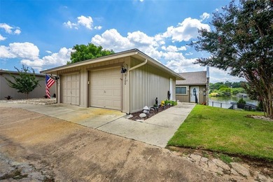 Enjoy lakefront living in this charming 2 bedroom, 1.5 bath on De Cordova Bend Country Club in Texas - for sale on GolfHomes.com, golf home, golf lot