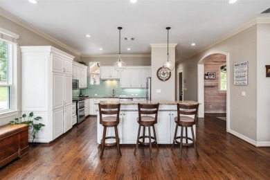 Spacious and inviting, this 4 bedroom, 5 bathroom home offers on Cedar Creek Country Club in Texas - for sale on GolfHomes.com, golf home, golf lot