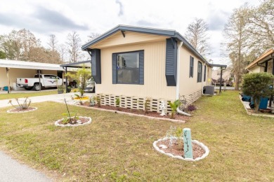 Welcome to this charming canal-front home in Anglers Green on Anglers Green Golf Course in Florida - for sale on GolfHomes.com, golf home, golf lot