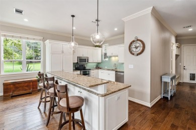 Spacious and inviting, this 4 bedroom, 5 bathroom home offers on Cedar Creek Country Club in Texas - for sale on GolfHomes.com, golf home, golf lot