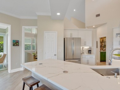 Stunning designer renovation of this two story Victoria Island on Grand Harbor Golf and Country Club in Florida - for sale on GolfHomes.com, golf home, golf lot