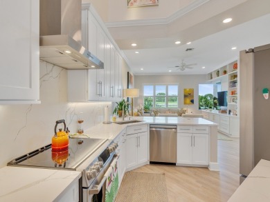 Stunning designer renovation of this two story Victoria Island on Grand Harbor Golf and Country Club in Florida - for sale on GolfHomes.com, golf home, golf lot