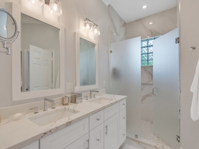 Stunning designer renovation of this two story Victoria Island on Grand Harbor Golf and Country Club in Florida - for sale on GolfHomes.com, golf home, golf lot