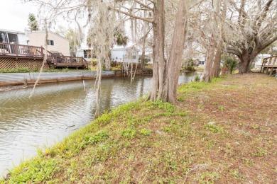 Welcome to this charming canal-front home in Anglers Green on Anglers Green Golf Course in Florida - for sale on GolfHomes.com, golf home, golf lot