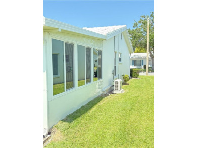 Beautiful completely updated home in the Mainlands community on Mainlands Golf Club in Florida - for sale on GolfHomes.com, golf home, golf lot