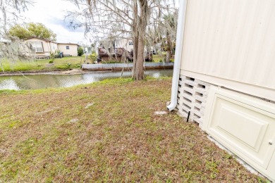 Welcome to this charming canal-front home in Anglers Green on Anglers Green Golf Course in Florida - for sale on GolfHomes.com, golf home, golf lot