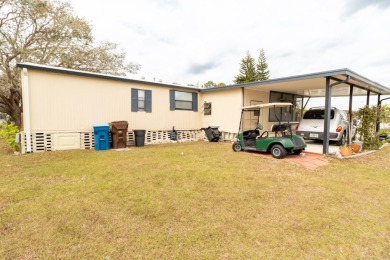 Welcome to this charming canal-front home in Anglers Green on Anglers Green Golf Course in Florida - for sale on GolfHomes.com, golf home, golf lot