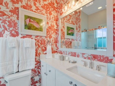 Stunning designer renovation of this two story Victoria Island on Grand Harbor Golf and Country Club in Florida - for sale on GolfHomes.com, golf home, golf lot