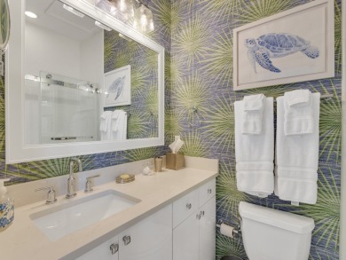 Stunning designer renovation of this two story Victoria Island on Grand Harbor Golf and Country Club in Florida - for sale on GolfHomes.com, golf home, golf lot