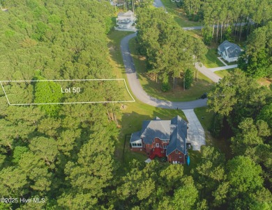 Easy, flat, elevated homesite.  Just steps from the park and on Minnesott Golf and Country Club in North Carolina - for sale on GolfHomes.com, golf home, golf lot