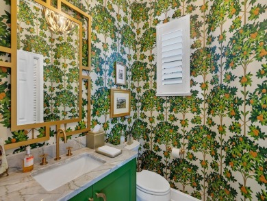 Stunning designer renovation of this two story Victoria Island on Grand Harbor Golf and Country Club in Florida - for sale on GolfHomes.com, golf home, golf lot