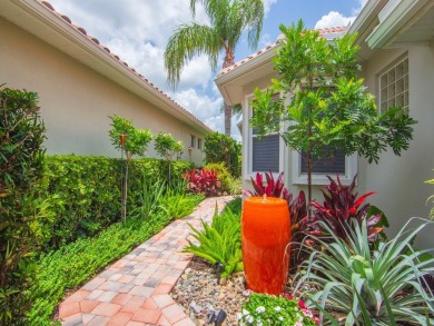 Stunning designer renovation of this two story Victoria Island on Grand Harbor Golf and Country Club in Florida - for sale on GolfHomes.com, golf home, golf lot