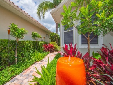 Stunning designer renovation of this two story Victoria Island on Grand Harbor Golf and Country Club in Florida - for sale on GolfHomes.com, golf home, golf lot