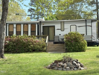 Waterfront Lot with 39' Forest River Camper - Lake Royale

 on River Golf and County Club at Lake Royale in North Carolina - for sale on GolfHomes.com, golf home, golf lot