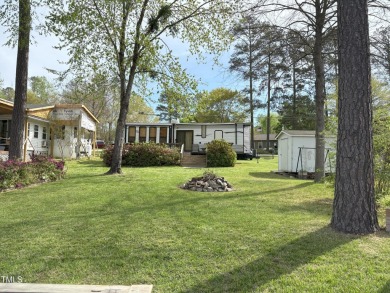 Waterfront Lot with 39' Forest River Camper - Lake Royale

 on River Golf and County Club at Lake Royale in North Carolina - for sale on GolfHomes.com, golf home, golf lot