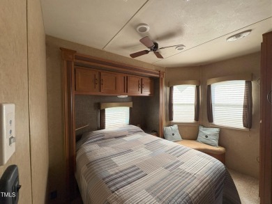 Waterfront Lot with 39' Forest River Camper - Lake Royale

 on River Golf and County Club at Lake Royale in North Carolina - for sale on GolfHomes.com, golf home, golf lot