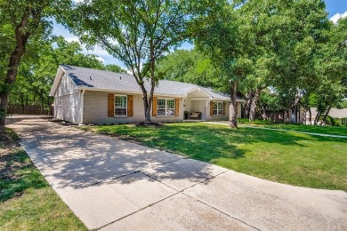 Welcome to your dream home in Woodland Park Estates! This on Lake Arlington Golf Course in Texas - for sale on GolfHomes.com, golf home, golf lot