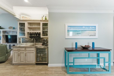 Meticulously maintained home overlooking #3 Lakes fairway and on Peninsula Golf and Racquet Club in Alabama - for sale on GolfHomes.com, golf home, golf lot