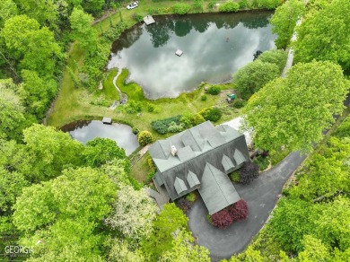 5.75 acres at 3300 feet elevation with 2 ponds and a waterfall on Sky Valley Resort and Country Club in Georgia - for sale on GolfHomes.com, golf home, golf lot