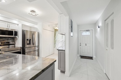 Come see this stunning, move-in-ready unit in Bonaire Village! on Marina Lakes Golf Course in Florida - for sale on GolfHomes.com, golf home, golf lot