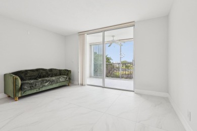 Come see this stunning, move-in-ready unit in Bonaire Village! on Marina Lakes Golf Course in Florida - for sale on GolfHomes.com, golf home, golf lot