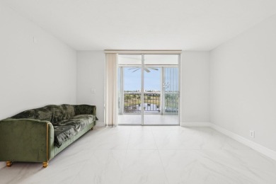 Come see this stunning, move-in-ready unit in Bonaire Village! on Marina Lakes Golf Course in Florida - for sale on GolfHomes.com, golf home, golf lot